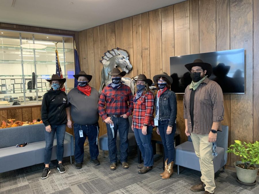 A group of teachers dressed in country gear. 