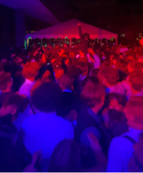 Students dancing in the mosh pit at the homecoming dance