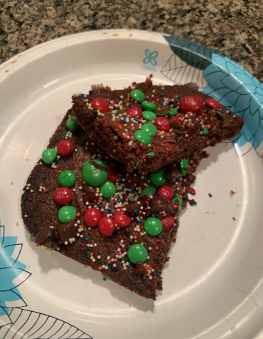 Two brownie sitting on a platter