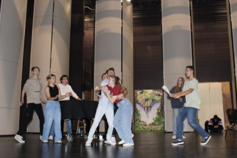 The cast of The Musical Comedy Murders of 1940 rehearsing the show on Oct. 10th, 2022. Shown in photographs are Hayden Cota, Orion Hardin, Jett Gomez, Tyler Douglas, Shayan Khayambashi, Megan Recktenwald, Lauren Thompson, Carter Poindexter, and Maksim Smotkin.