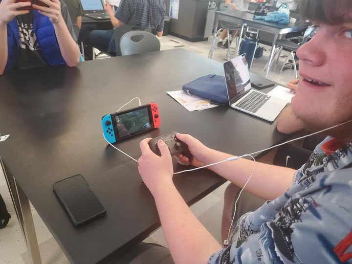 Grant Viers enjoying TOTK on his Nintendo Switch in class